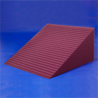 a purple triangular medical body wedge produced by the CNC Horizontal Cutter Machine