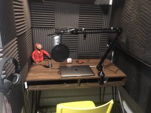 podcast studio with acoustic eggcrate foam on the walls